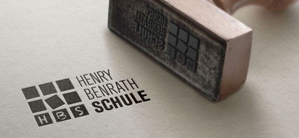 Das neue Logo der Henry-Benrath-Schule in Friedberg wurde von der WOA Werbeagentur gestaltet